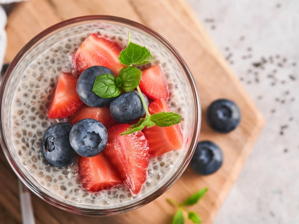 Coconut chia pudding topped with berries
