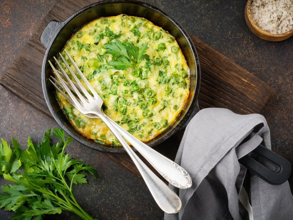 Frittata with leeks, green peas, and herbs