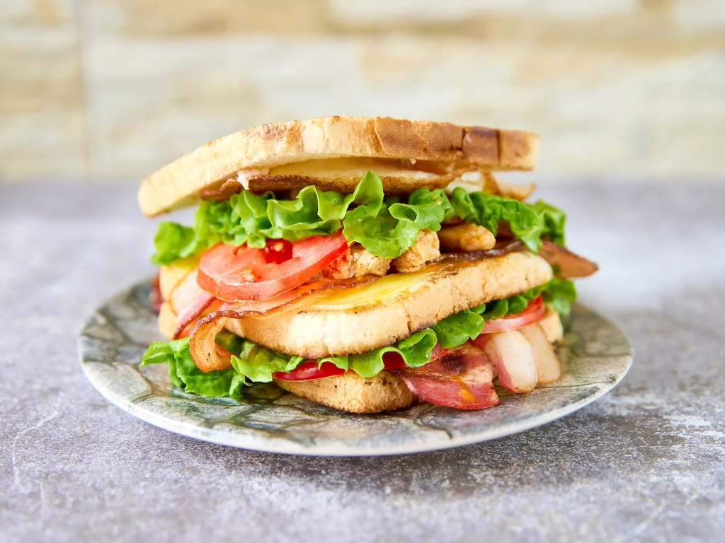 Breakfast BLT sandwich served on a plate