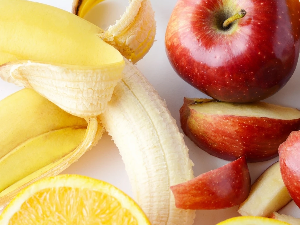 Close-up of apples and bananas