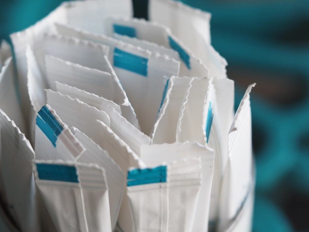 Packets of artificial sweetener