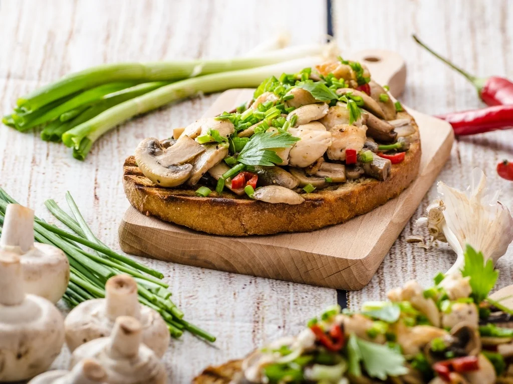 Toast with mushrooms and fried chicken, sprinkled with Toast with mushrooms and fried chicken