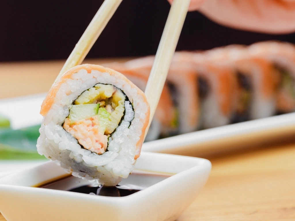 Sushi dipped in soy sauce