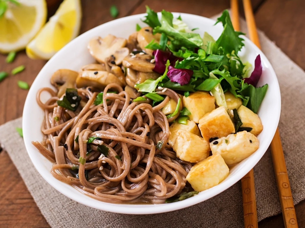 Miso and soba noodle soup with roasted tofu and mushrooms