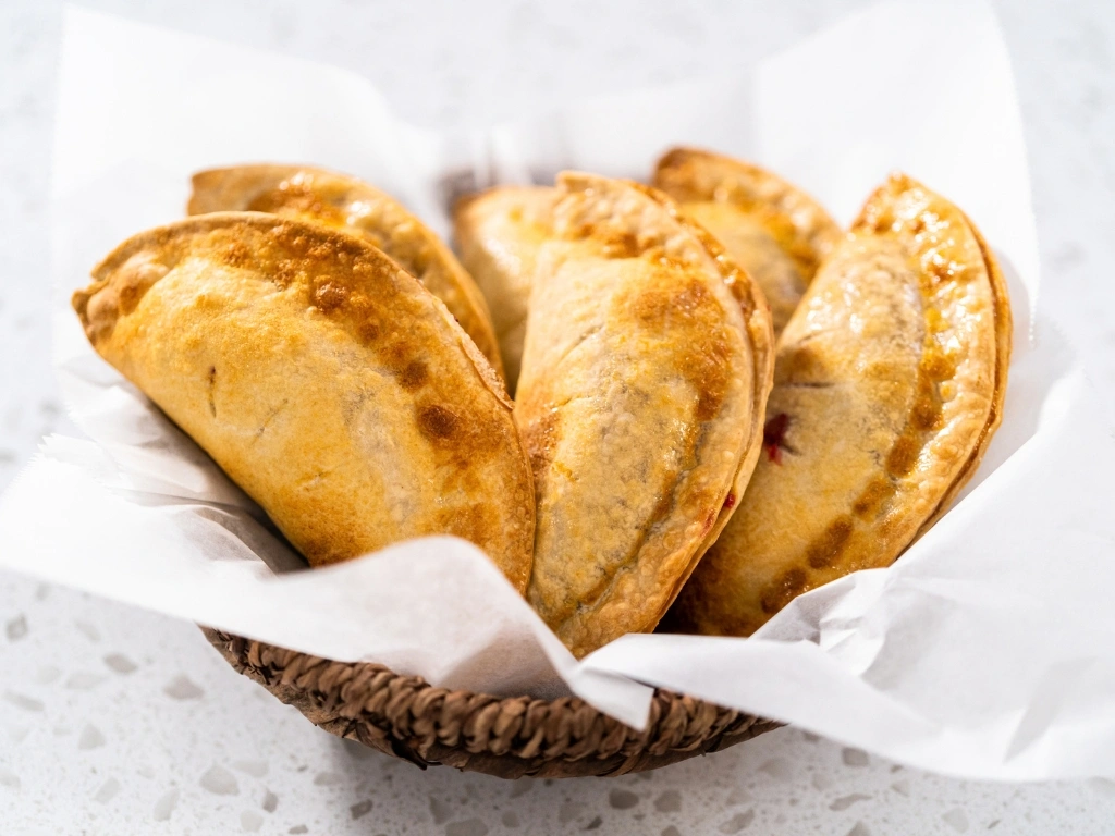 Basket of baked chicken empanadas