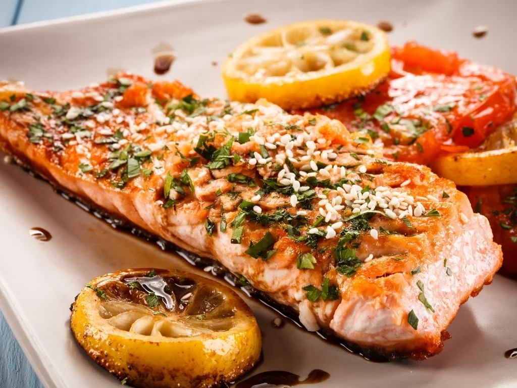 Grilled Salmon Fish on Top of Grilled Vegetables