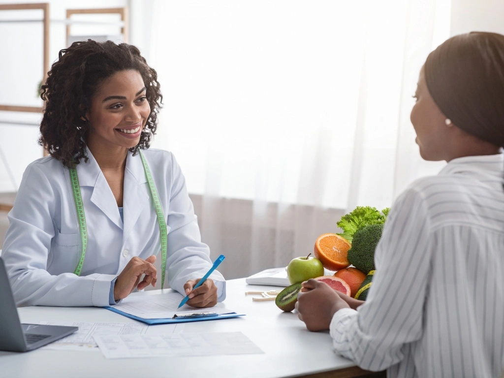 Dietitian speaking with a client during a nutrition counselling session