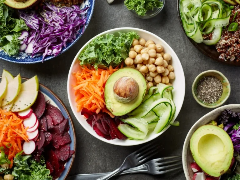 Variety of healthy vegan meals arranged on a dining table