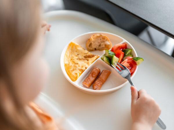 A little girl having a healthy breakfast