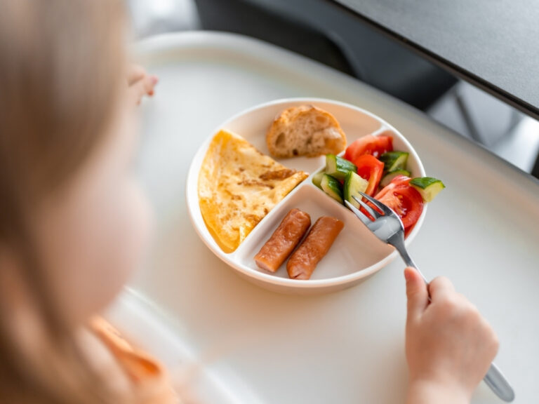 A little girl having a healthy breakfast