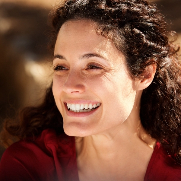 Close up young woman smiling
