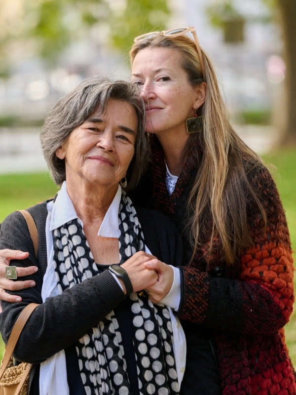 A Daughters Support for Her Mother on a Beautiful Autumn Day.