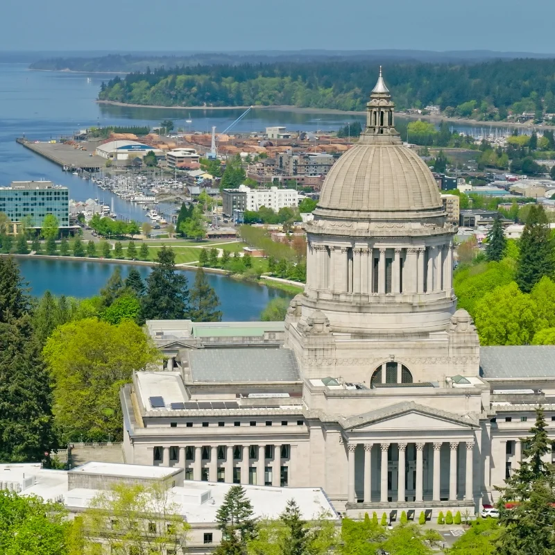 the Washington State Capitol building and the surrounding campus and city of Olympia, Washington.