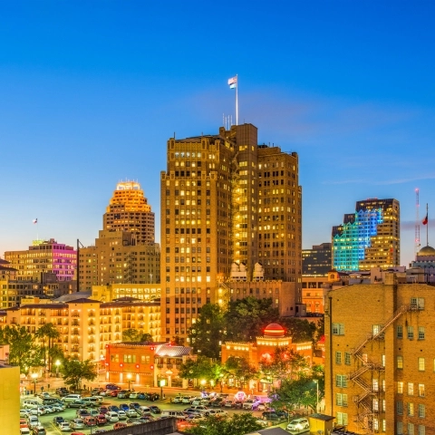 The skyline of San Antonio, Texas, at dusk.