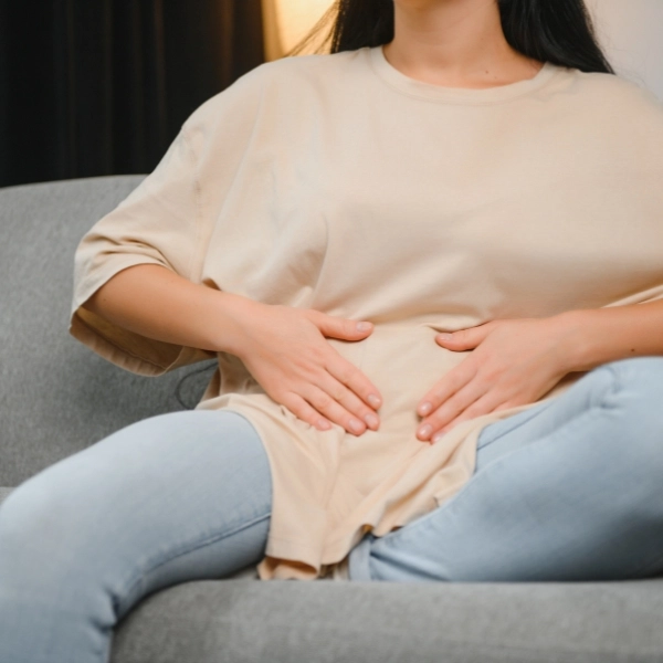 woman with stomachache suffering